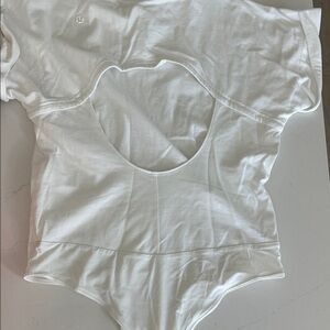 BNWOT LULULEMON COTTON OPEN BACK BODYSUIT SZ 6. Just tried on. No flaws